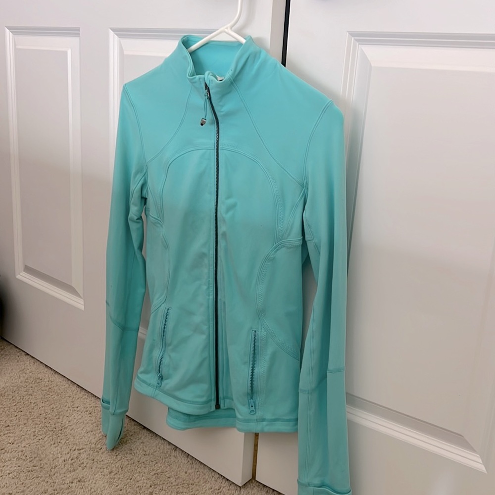 Lululemon zip up jacket barely worn. Near perfect condition. Fits like a sm/med
